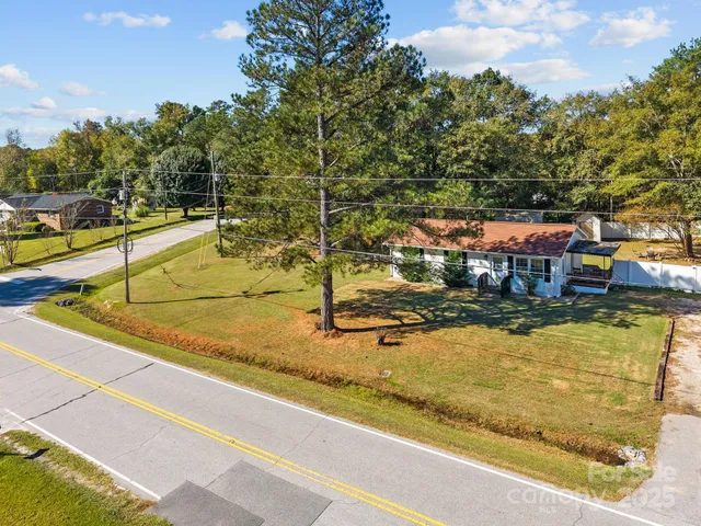 a view of a swimming pool with an outdoor seating