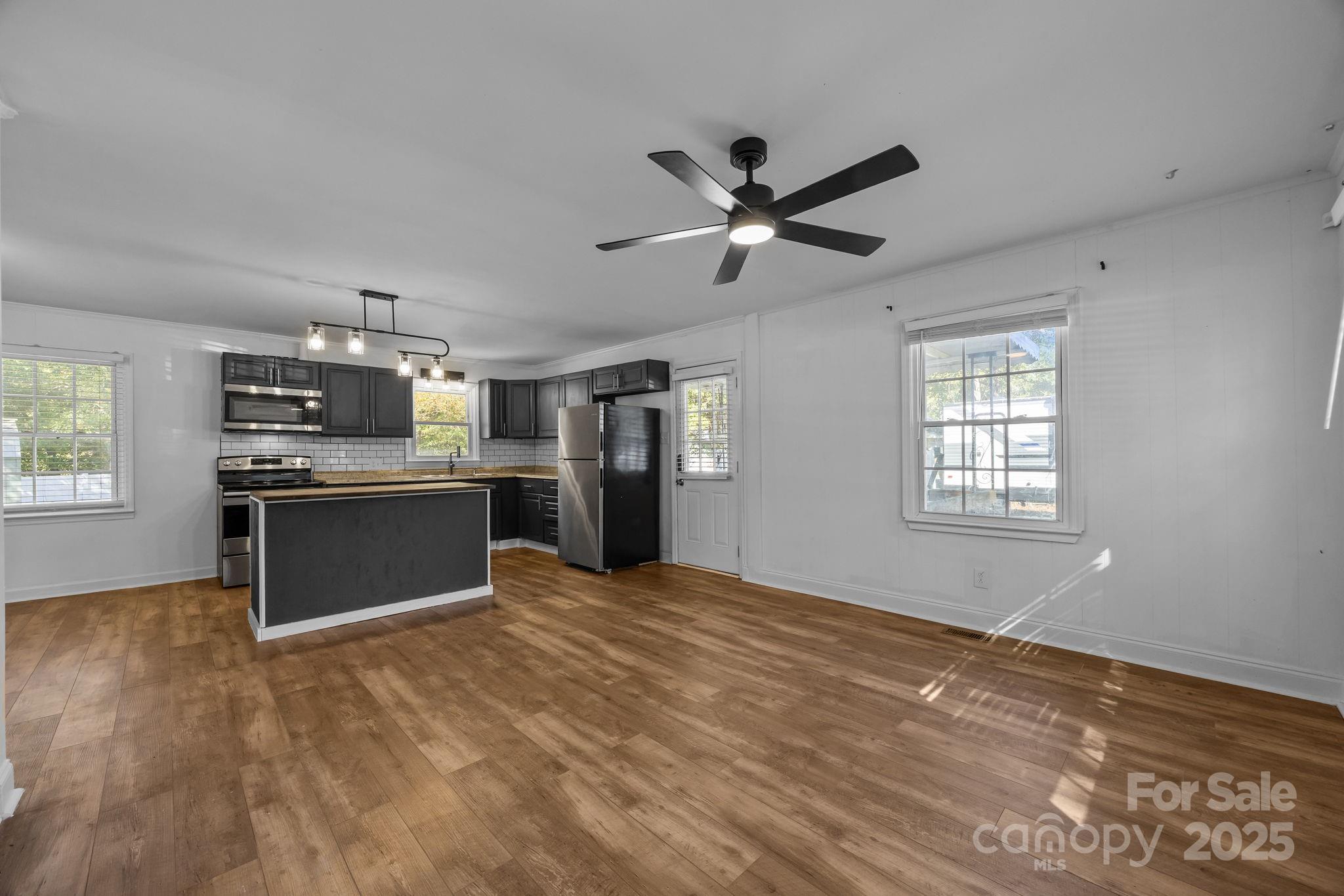976 10 Oaks Drive Lancaster, SC 29720 - Photo 9 of 24 a view of kitchen with granite countertop cabinets and window