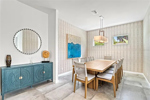 a view of a dining room with furniture