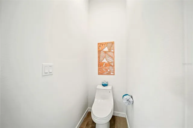 a view of a livingroom with furniture and an entryway