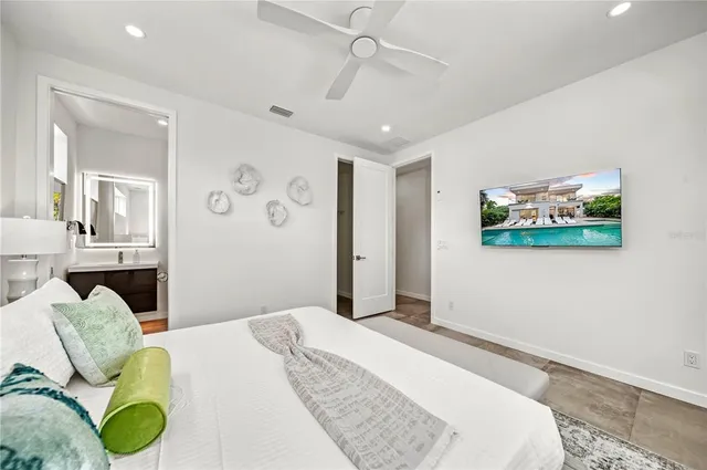 a bathroom with a toilet sink and shower