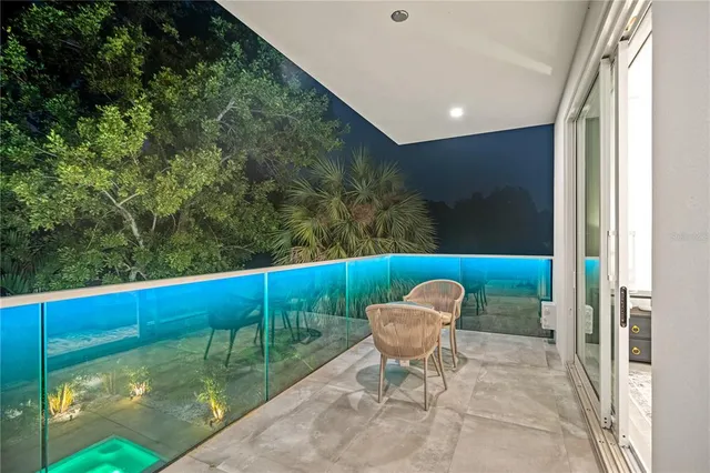 a view of swimming pool with a patio