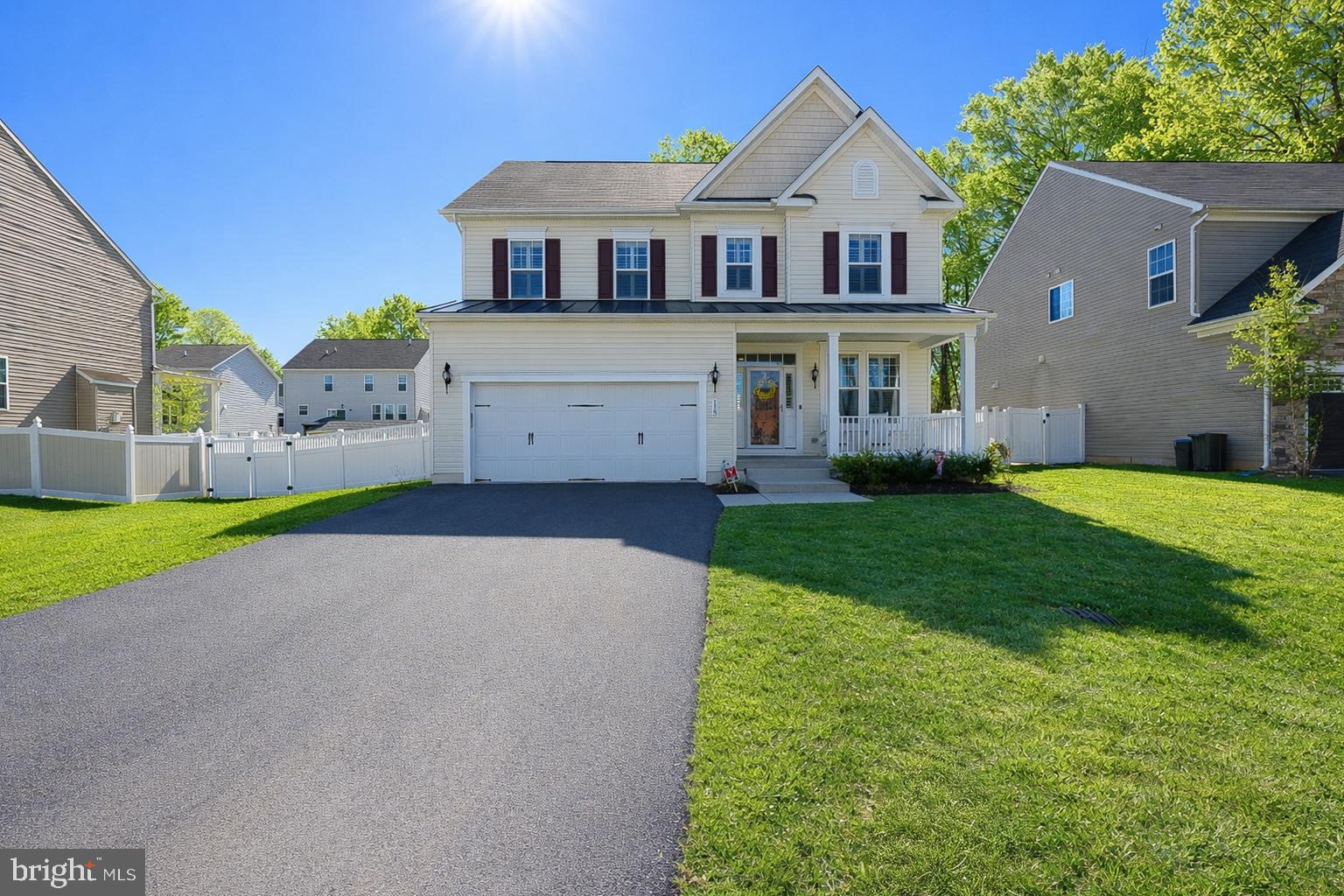 113 Harding Street Lutherville-Timonium, MD 21093 - Photo 1 of 45 a front view of a house with a yard and garage