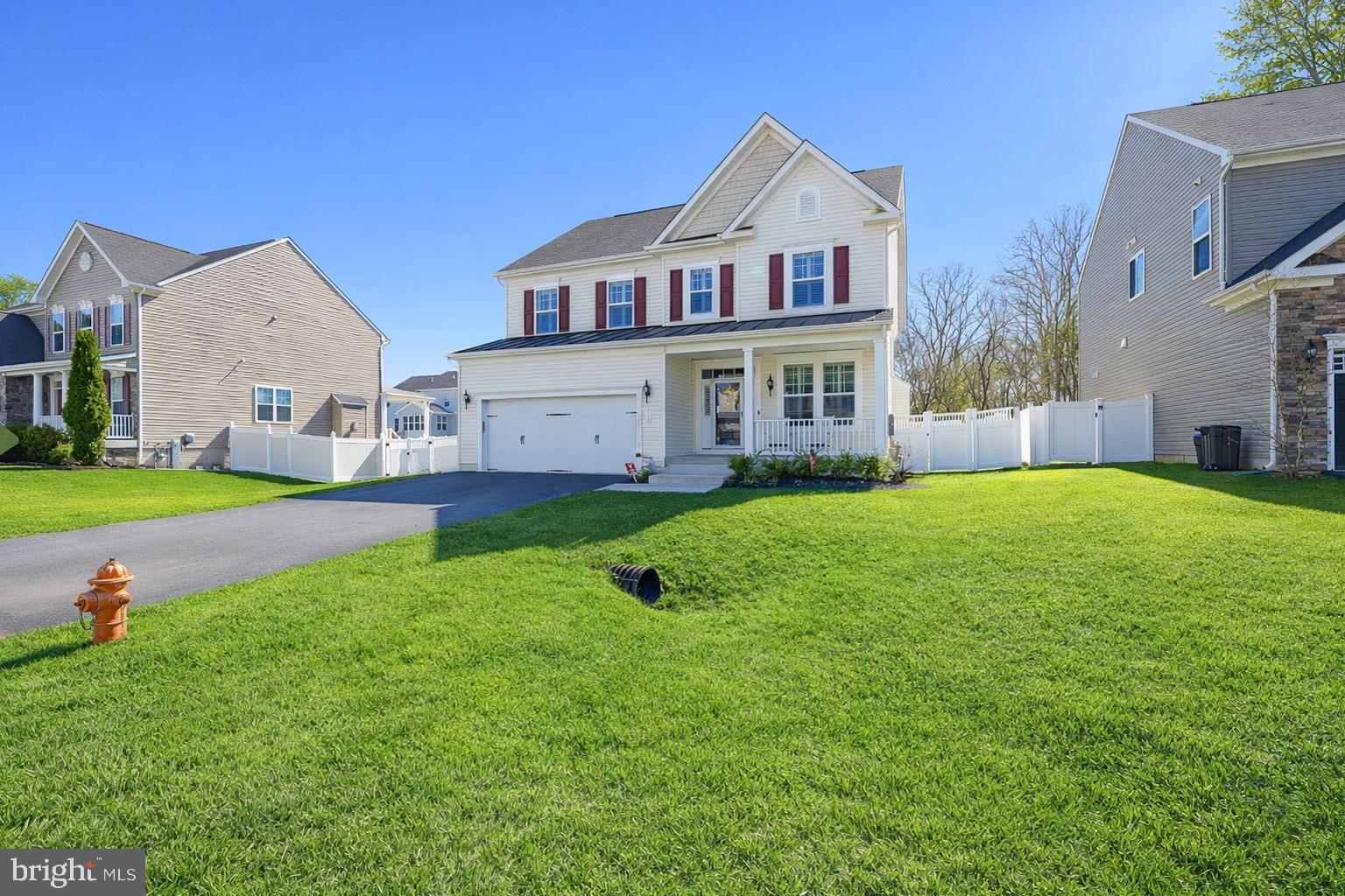 113 Harding Street Lutherville-Timonium, MD 21093 - Photo 2 of 45 a view of a house with a big yard and large trees
