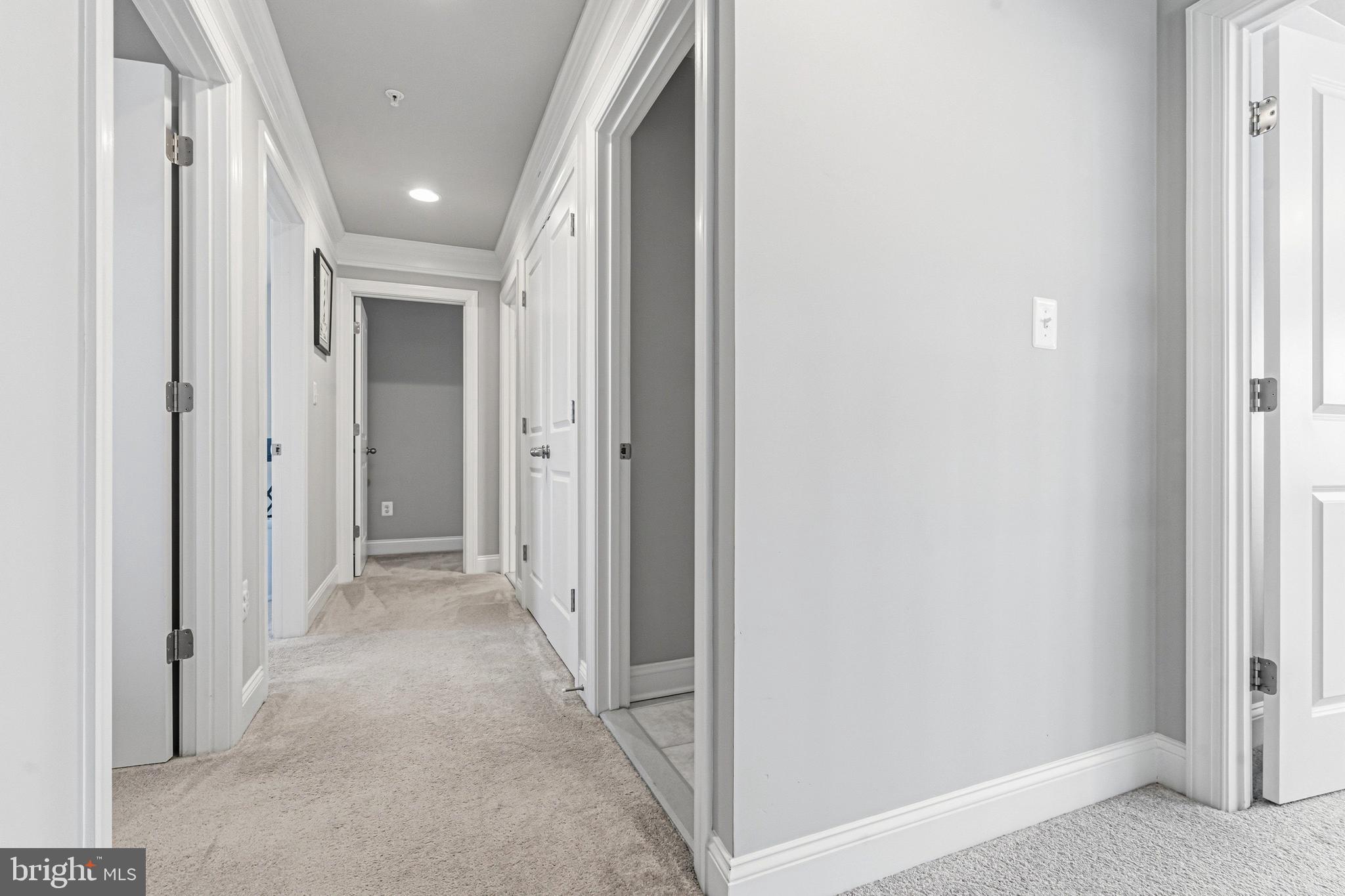 113 Harding Street Lutherville-Timonium, MD 21093 - Photo 24 of 45 a view of a hallway with wooden shelves