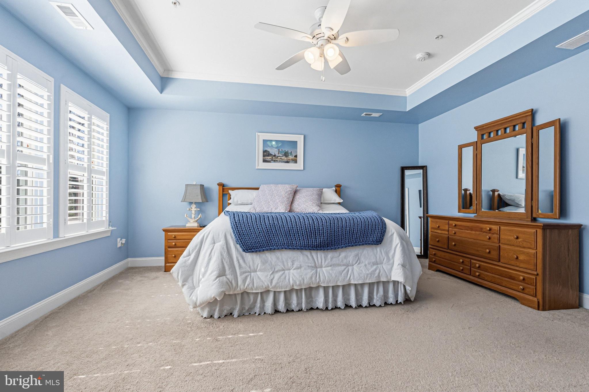 113 Harding Street Lutherville-Timonium, MD 21093 - Photo 26 of 45 a bedroom with a bed and a large mirror