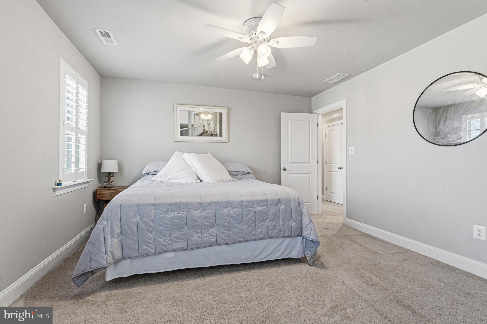113 Harding Street Lutherville-Timonium, MD 21093 - Photo 30 of 45 a bedroom with a bed and a chandelier