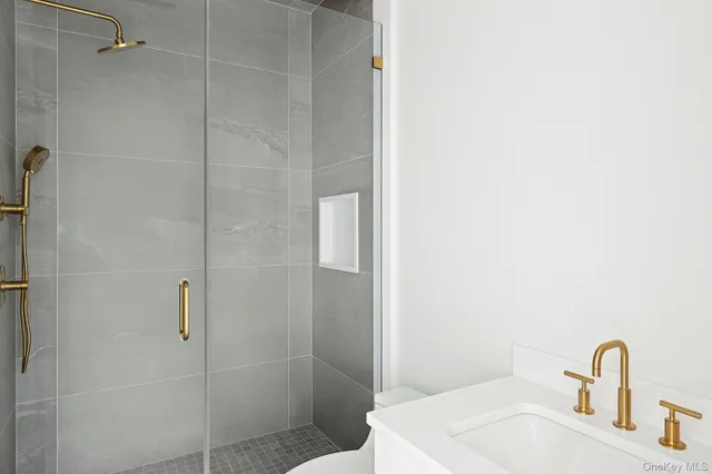 a bathroom with a sink and a shower