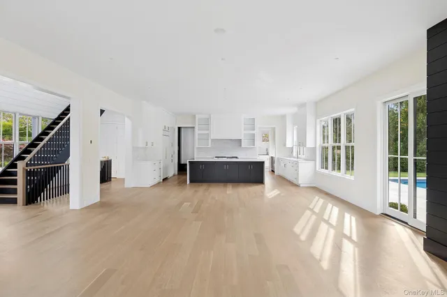 a view of livingroom with furniture and stairs
