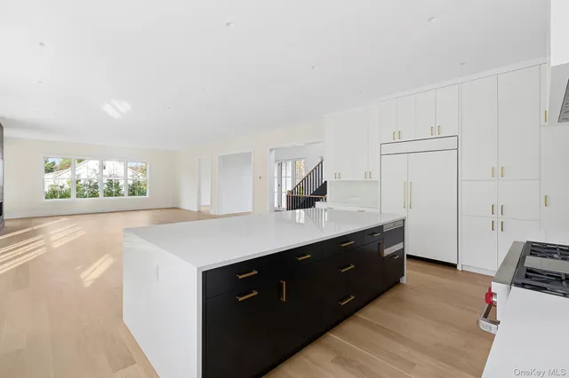 a kitchen with a cabinets and a sink