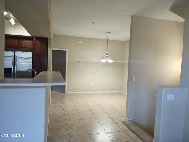 a view of a kitchen cabinets and a counter place