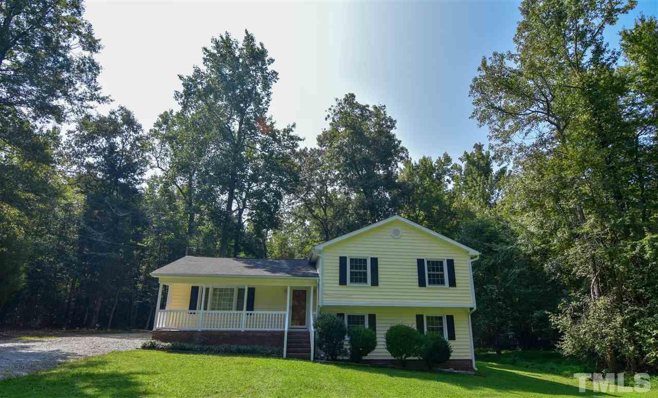 6354 Helena Moriah Road Rougemont, NC 27572 - Photo 1 of 21 a front view of a house with a garden
