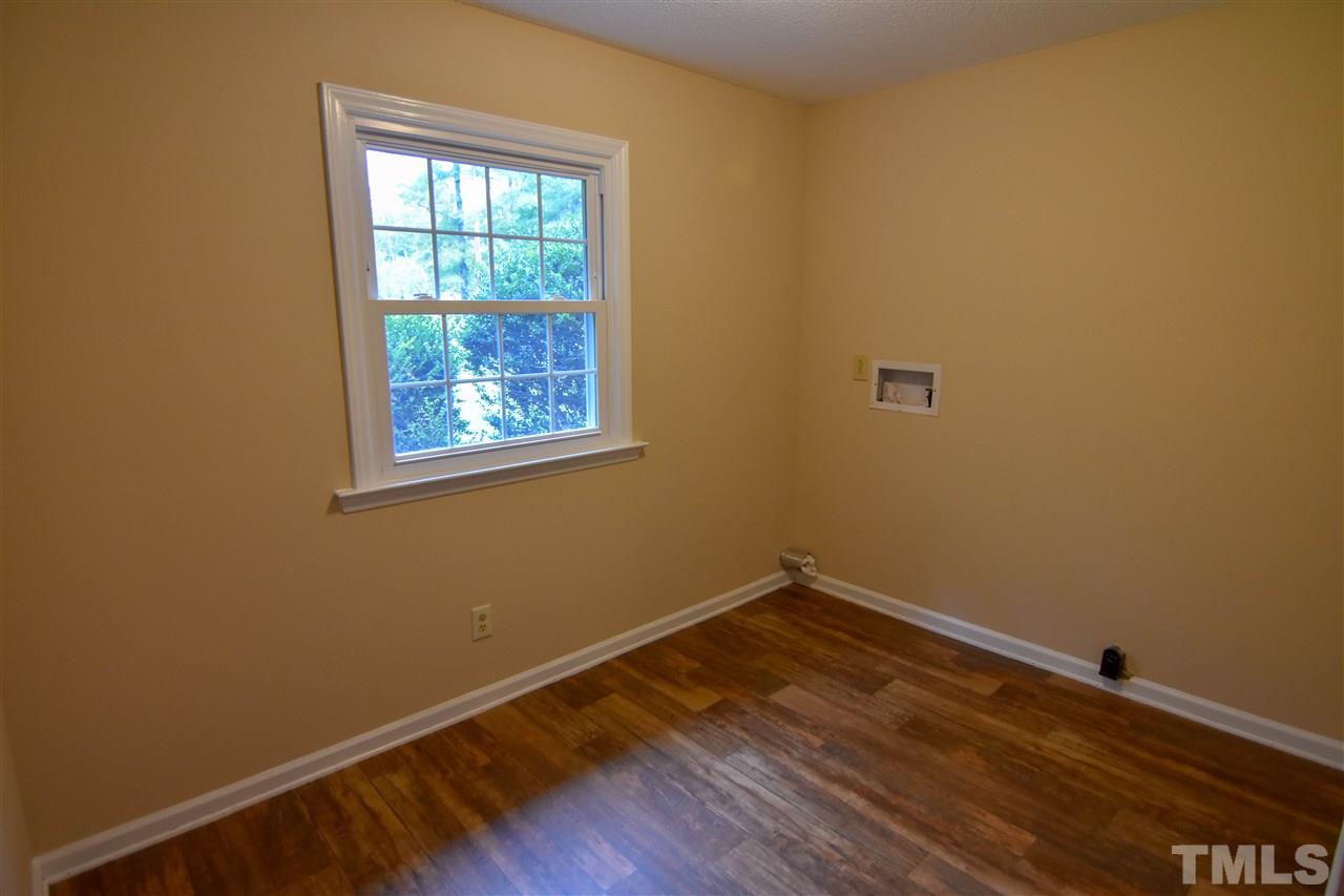 6354 Helena Moriah Road Rougemont, NC 27572 - Photo 17 of 21 a view of a room with wooden floor and a window