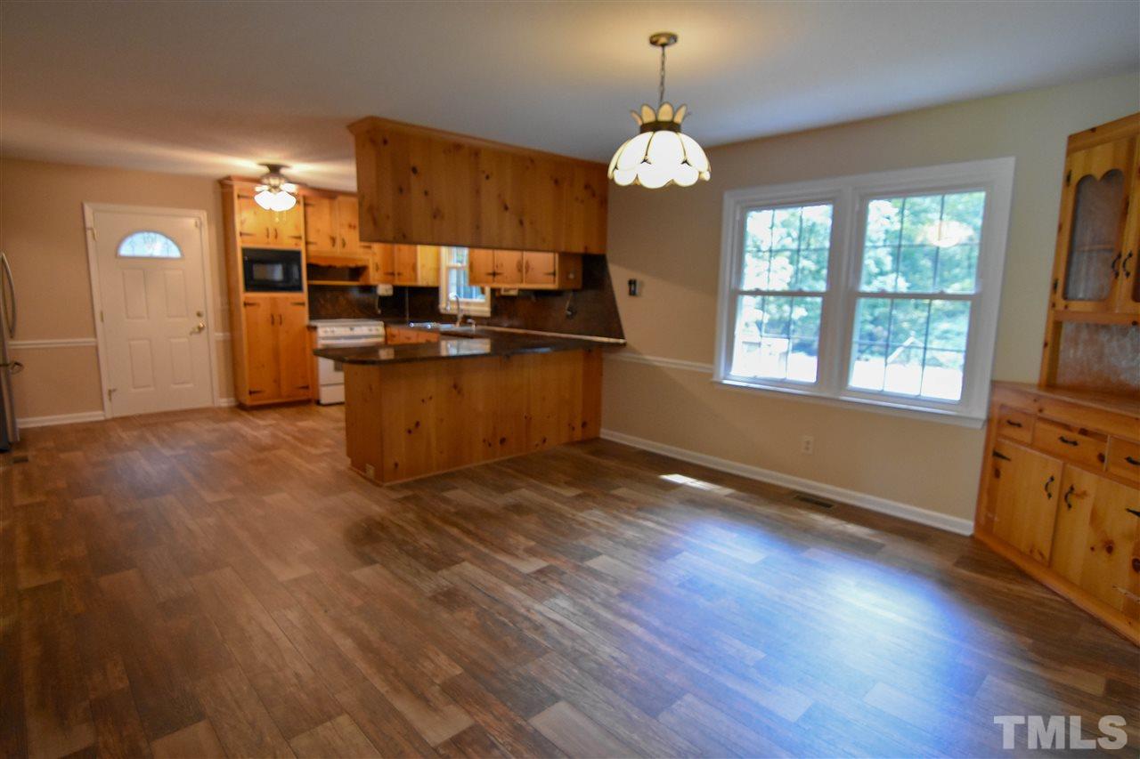 6354 Helena Moriah Road Rougemont, NC 27572 - Photo 3 of 21 a view of kitchen and dining room with wooden floor