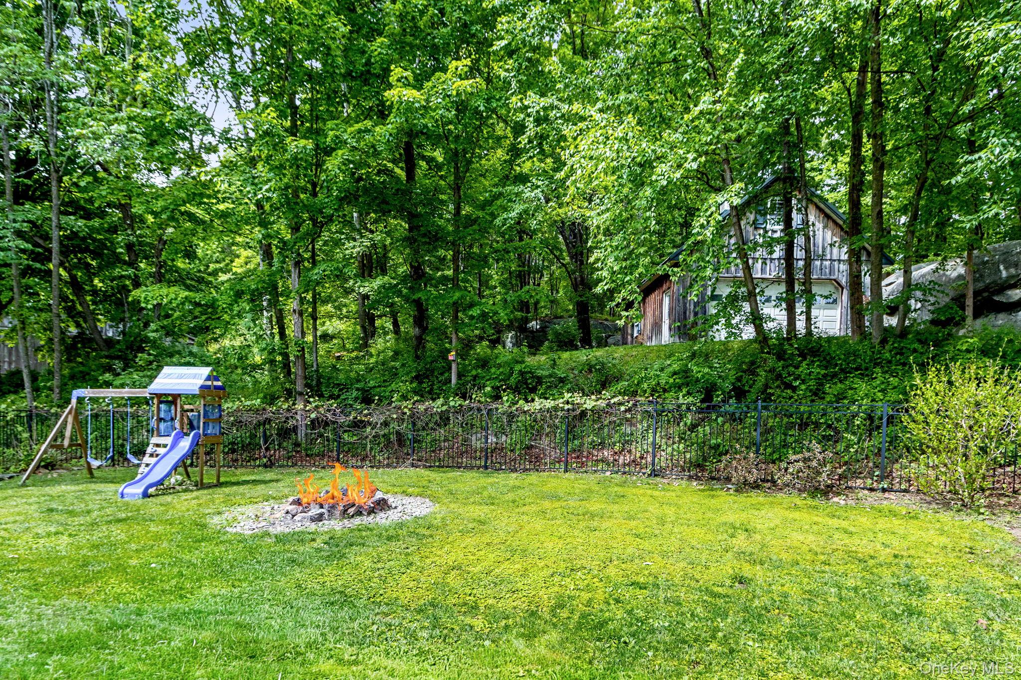168 Old Rte 55 Pawling, NY 12564 - Photo 30 of 43 a view of a backyard with a garden and entertaining space