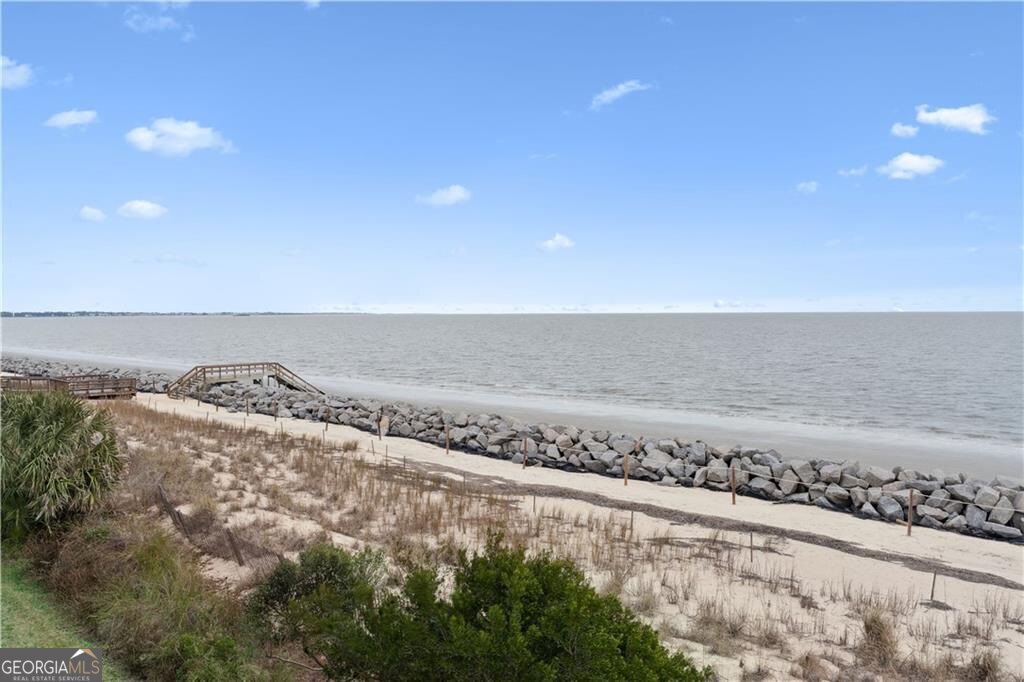 172 Turtle Track Lane, Unit OCEAN Jekyll Island, GA 31527 - Photo 41 of 51 a view of an ocean beach and mountain