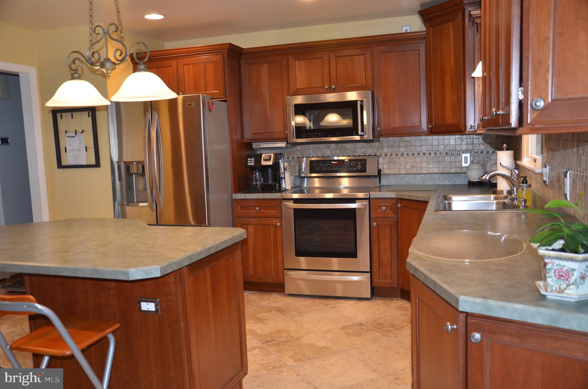 19704 Trunk Road White Hall, MD 21161 - Photo 16 of 59 Ceramic tile floors throughout the kitchen