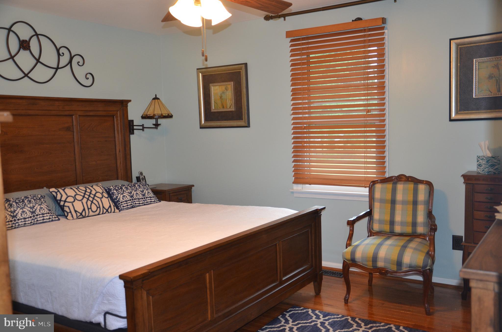 19704 Trunk Road White Hall, MD 21161 - Photo 20 of 59 Master bedroom has wood floors as well
