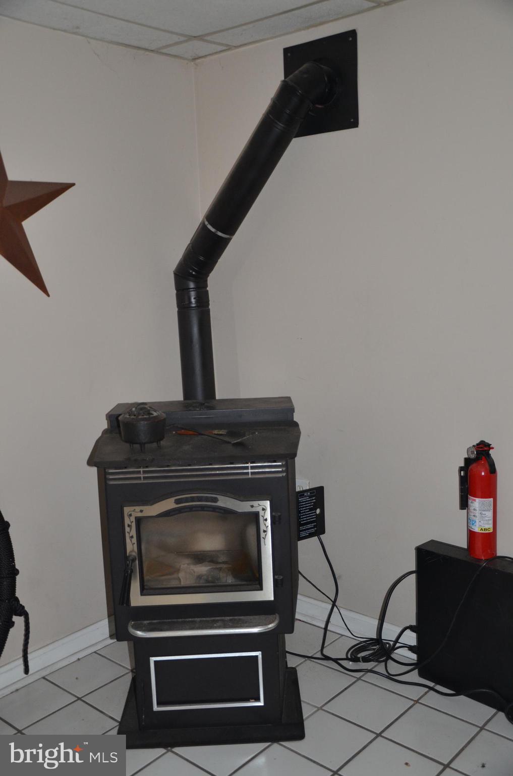19704 Trunk Road White Hall, MD 21161 - Photo 34 of 59 Pellet stove to help warm winter evenings