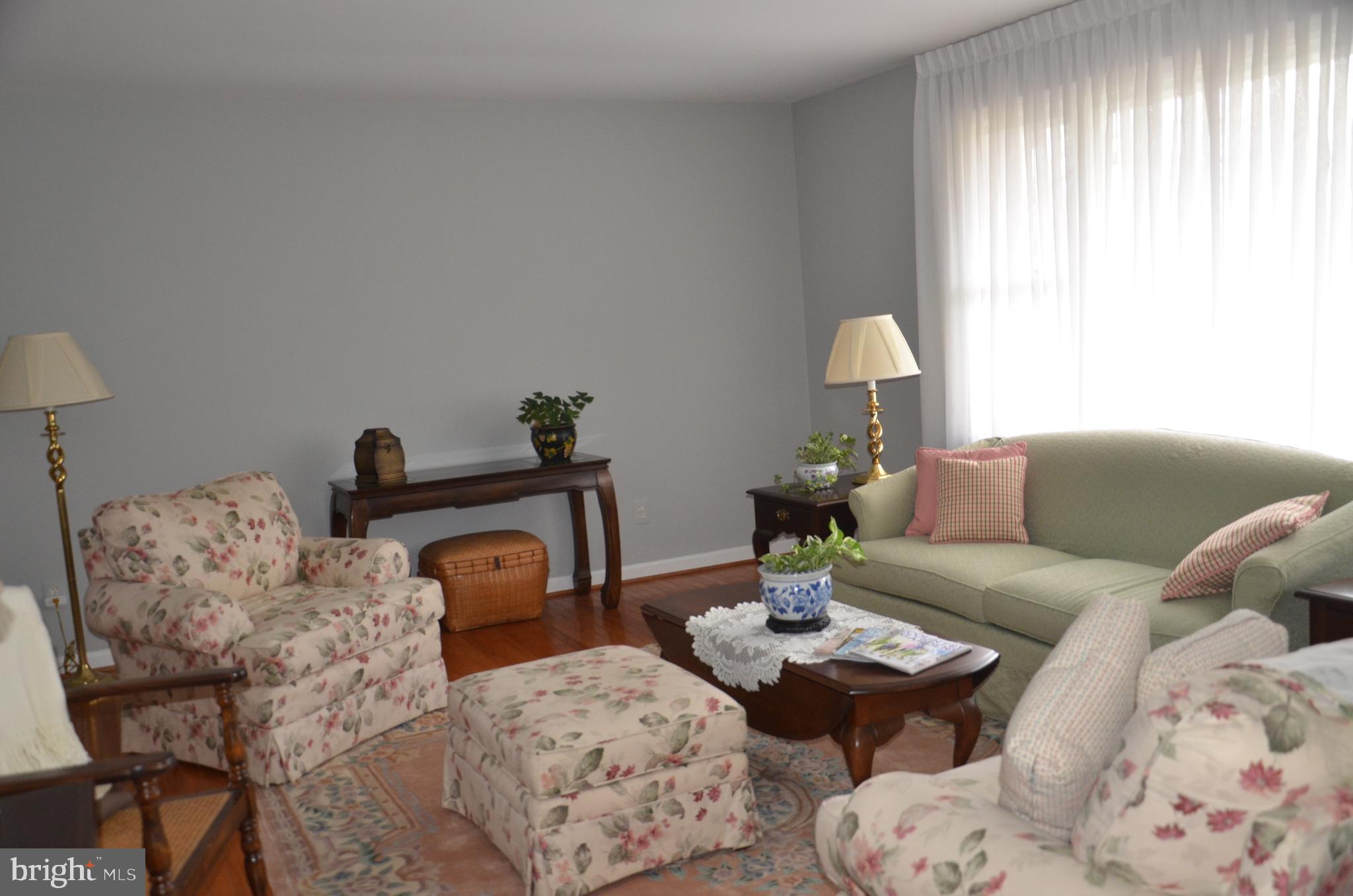 19704 Trunk Road White Hall, MD 21161 - Photo 5 of 59 The formal living room has a large bay window