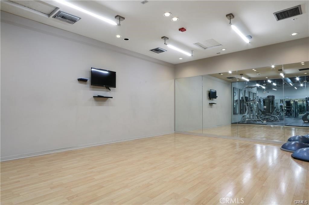 133 The Promenade North, Unit 402 Long Beach, CA 90802 - Photo 21 of 26 a view of a livingroom with a flat screen tv