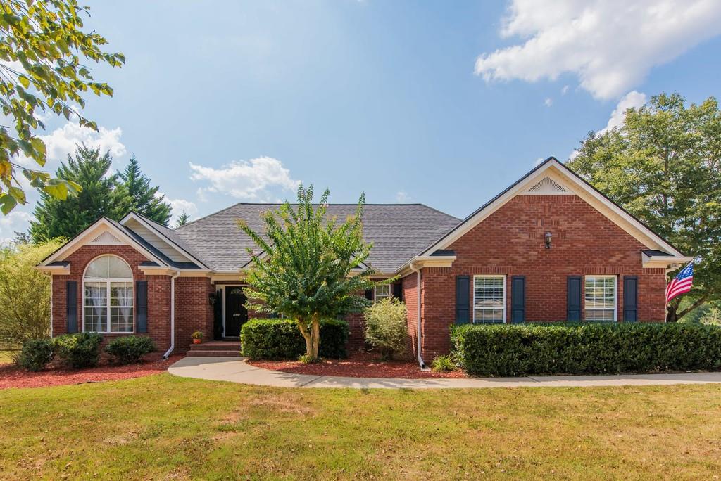 690 Hitchcock Road Dallas, GA 30157 - Photo 1 of 1 a front view of a house with yard and green space