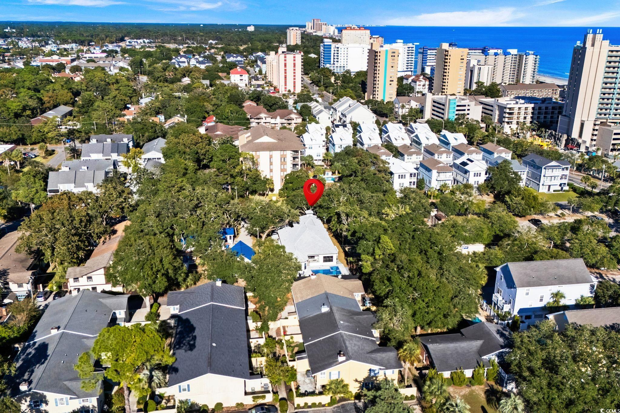311 73rd Avenue North Myrtle Beach, SC 29572 - Photo 5 of 40 Aerial view of property's location with a large body of water