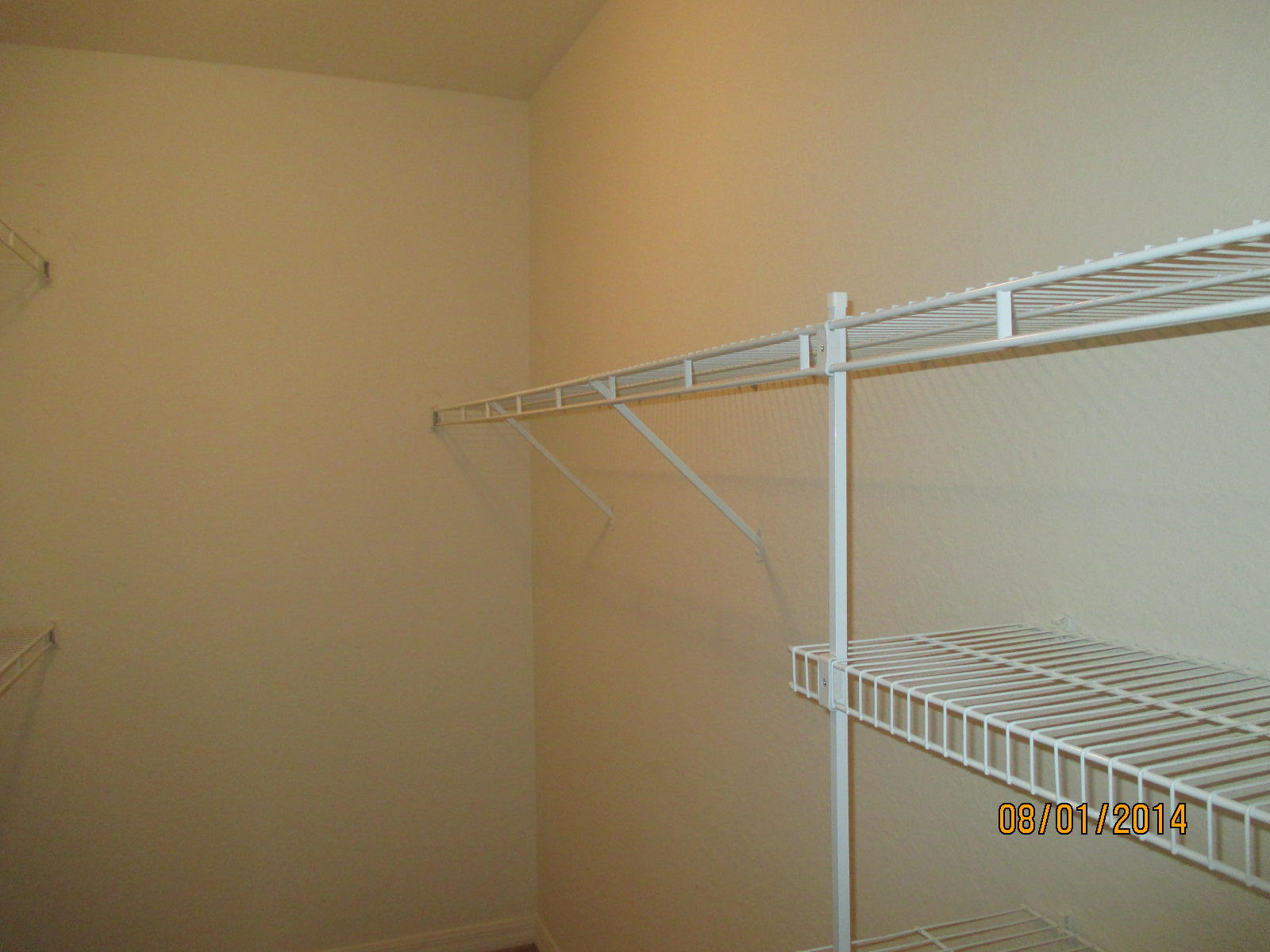 541 Southeast Prescott Place, Unit 541 Stuart, FL 34994 - Photo 13 of 20 a view of a room with racks on the wall