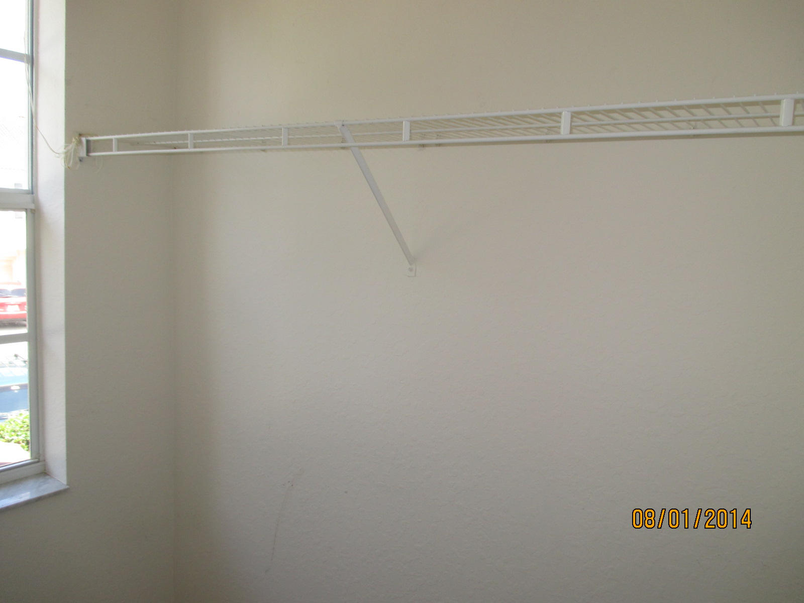 541 Southeast Prescott Place, Unit 541 Stuart, FL 34994 - Photo 17 of 20 a view of a rack on the wall