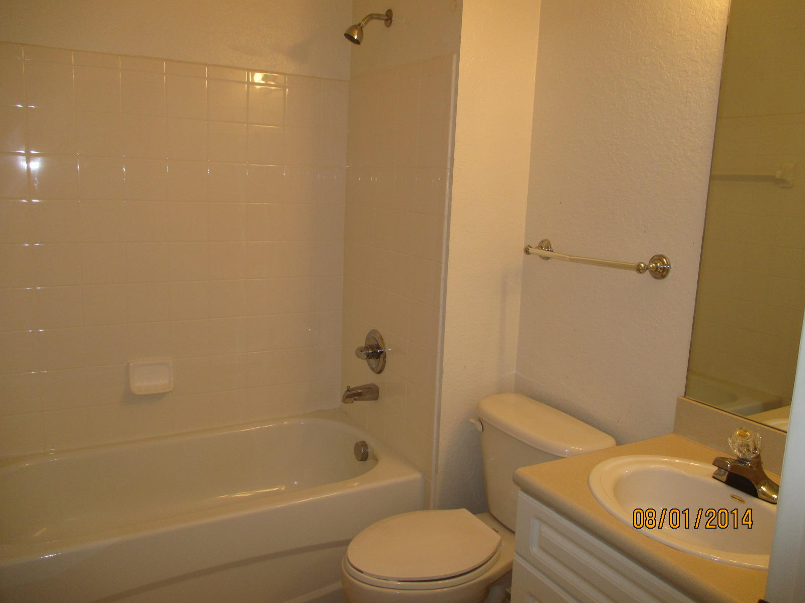 541 Southeast Prescott Place, Unit 541 Stuart, FL 34994 - Photo 18 of 20 a white toilet sitting next to a bath tub