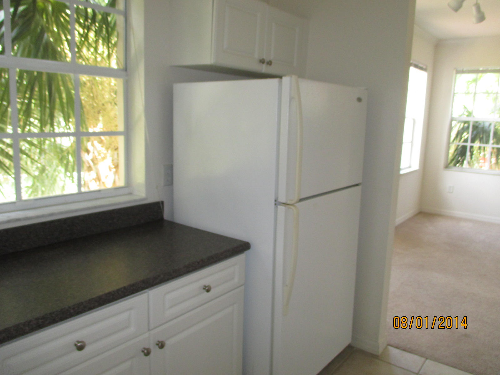 541 Southeast Prescott Place, Unit 541 Stuart, FL 34994 - Photo 10 of 20 a view of cabinets and window