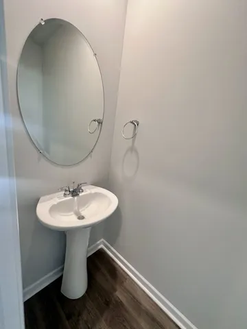 a view of storage and utility room with racks on the wall