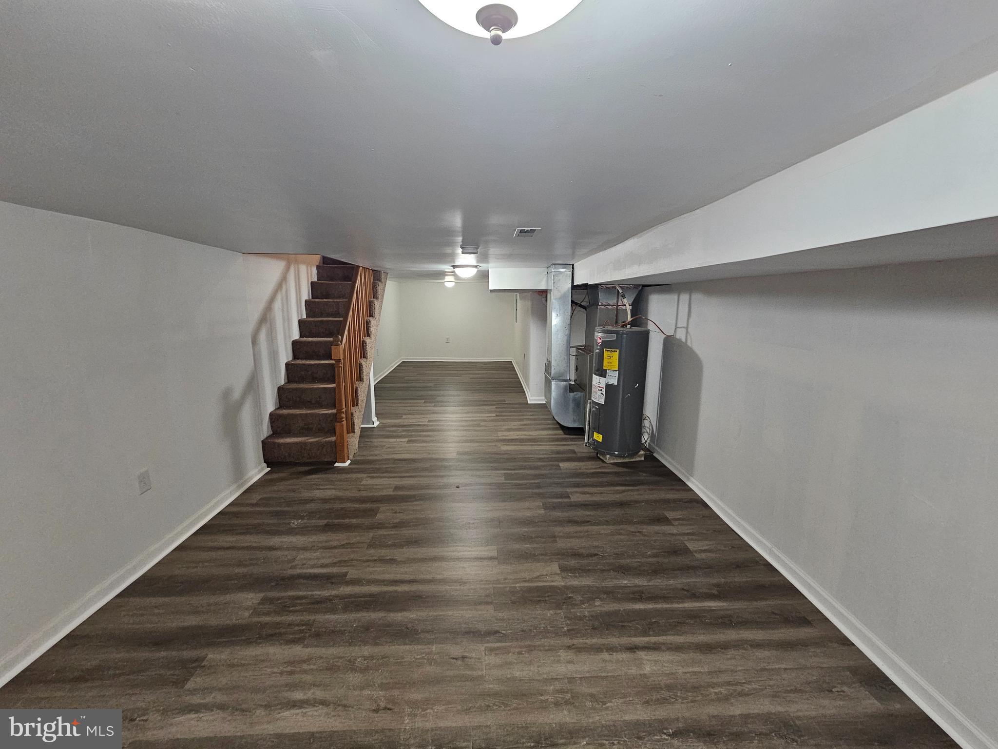 3025 Redner Street Philadelphia, PA 19121 - Photo 14 of 15 a view of a hallway with wooden floor