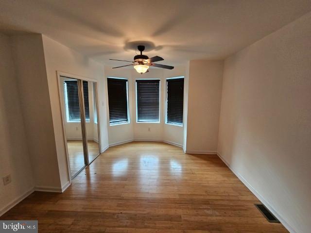 3025 Redner Street Philadelphia, PA 19121 - Photo 9 of 15 a view of an empty room with wooden floor and a window