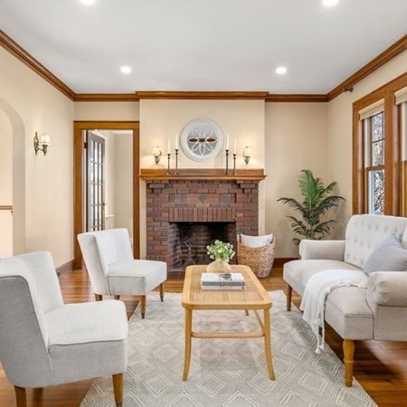 35 Welgate Road Medford, MA 02155 - Photo 11 of 40 a living room with furniture and a fireplace