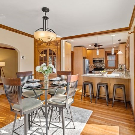 35 Welgate Road Medford, MA 02155 - Photo 17 of 40 a view of a dining room with furniture window and wooden floor