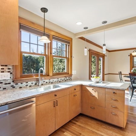 35 Welgate Road Medford, MA 02155 - Photo 20 of 40 a kitchen with a sink window and cabinets