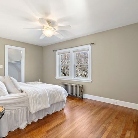 35 Welgate Road Medford, MA 02155 - Photo 23 of 40 a bedroom with a large bed and a window