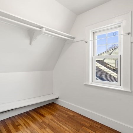35 Welgate Road Medford, MA 02155 - Photo 24 of 40 a view of an empty room with wooden floor and a window