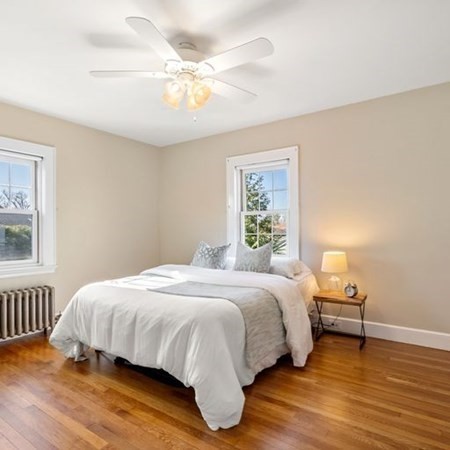 35 Welgate Road Medford, MA 02155 - Photo 25 of 40 a bedroom with a bed and a window