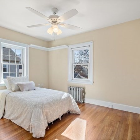 35 Welgate Road Medford, MA 02155 - Photo 26 of 40 a bedroom with a bed and a window