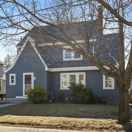 35 Welgate Road Medford, MA 02155 - Photo 3 of 40 a house that has a tree in front of it