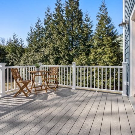 35 Welgate Road Medford, MA 02155 - Photo 32 of 40 a view of wooden deck with a bench