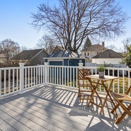 35 Welgate Road Medford, MA 02155 - Photo 34 of 40 a view of a wooden chairs on the terrace
