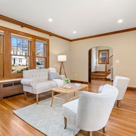 35 Welgate Road Medford, MA 02155 - Photo 8 of 40 a living room with furniture and a large window
