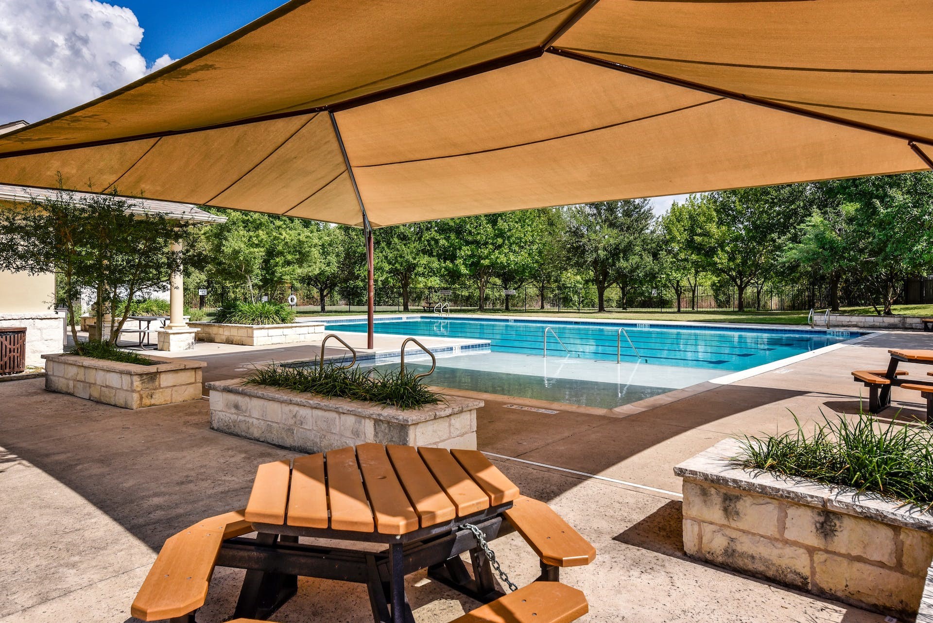 1713 Apache Trail Round Rock, TX 78665 - Photo 33 of 39 a view of a swimming pool with a patio