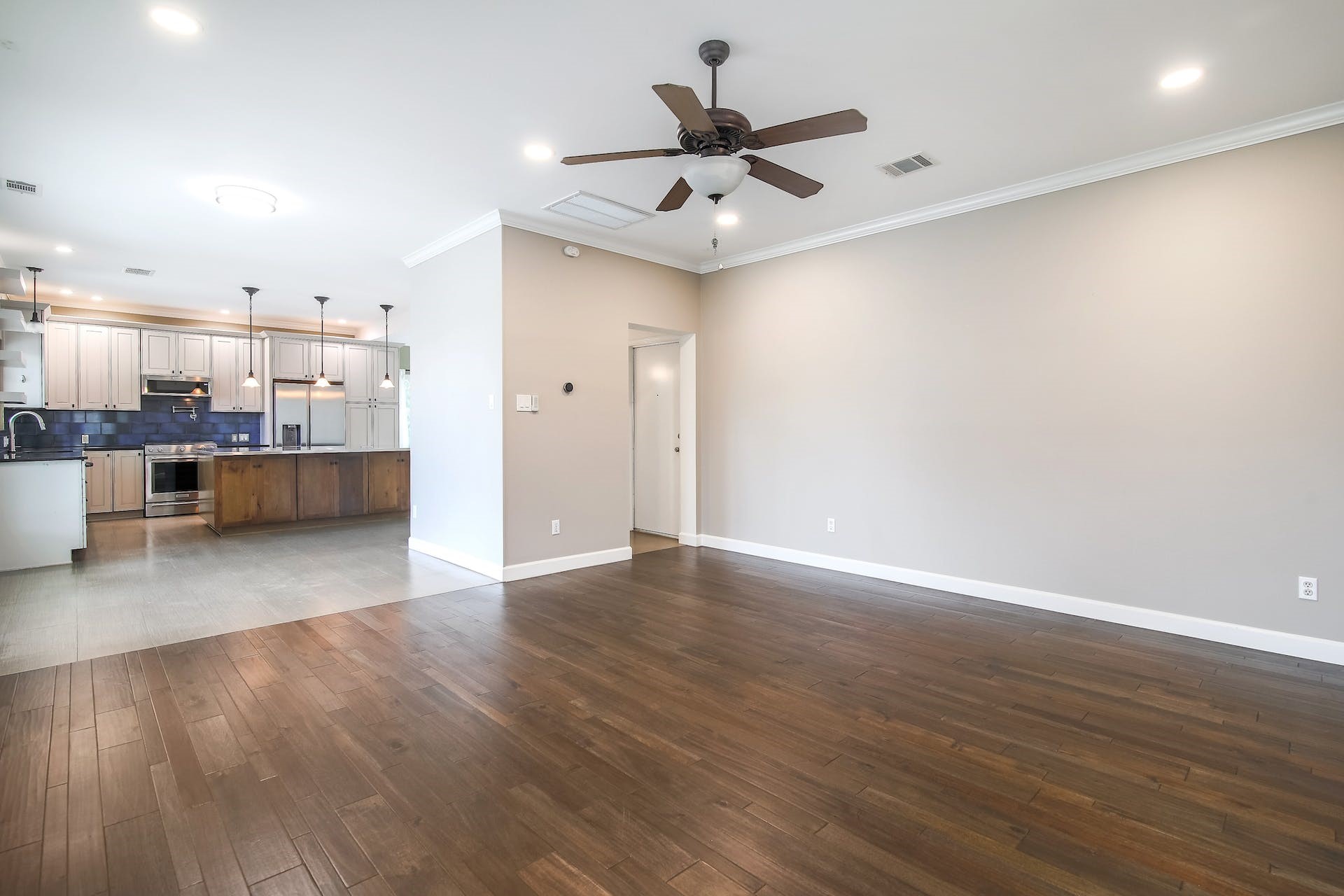 1713 Apache Trail Round Rock, TX 78665 - Photo 6 of 39 a view of a kitchen with a sink and wooden floor