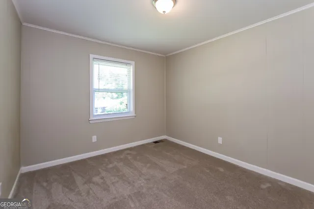 an empty room with a window