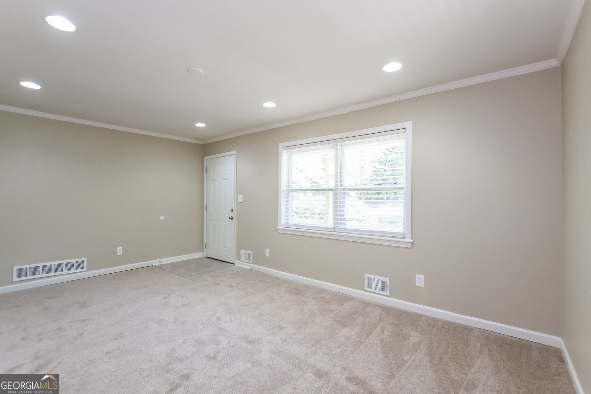 2309 Omaha Road Southwest Atlanta, GA 30331 - Photo 12 of 15 an empty room with windows