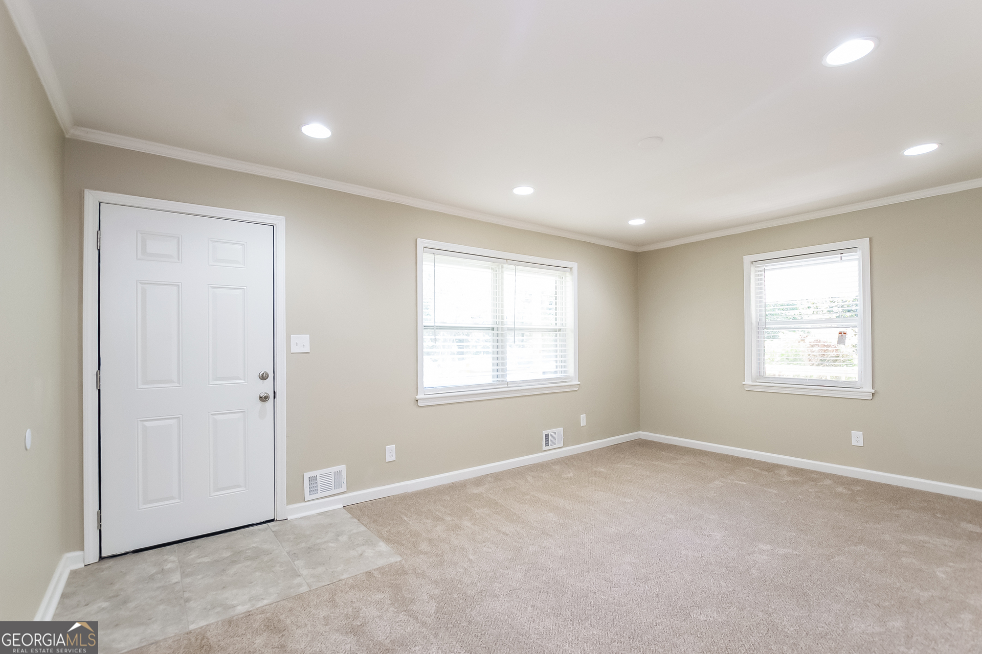 2309 Omaha Road Southwest Atlanta, GA 30331 - Photo 2 of 15 an empty room with windows